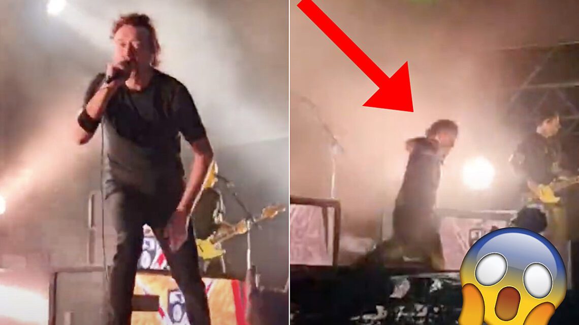 El líder de Rise Against cae en la brecha del escenario + sigue cantando
